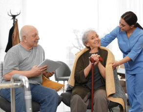 Nurse taking care of elderly patients in hospice